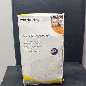 Medela Nursing Pads with Yellow Accents
